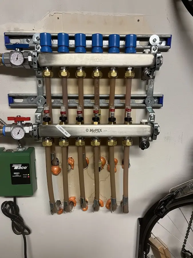 Plumber performing Water Heater Repair at a residential property in Mooresville